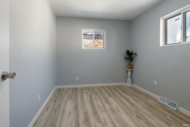 empty room featuring light hardwood / wood-style floors