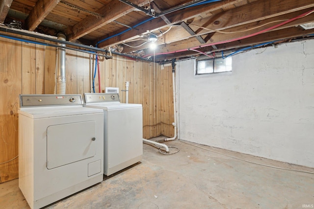 laundry area featuring washing machine and clothes dryer