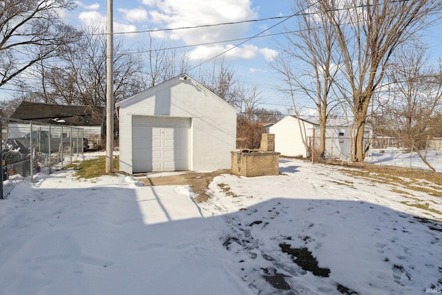 view of snow covered garage