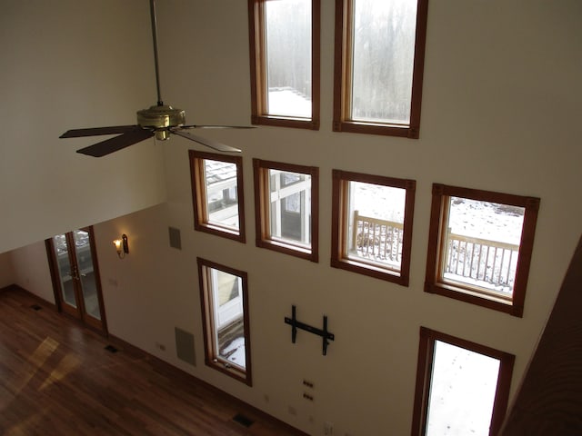 room details featuring hardwood / wood-style floors and ceiling fan