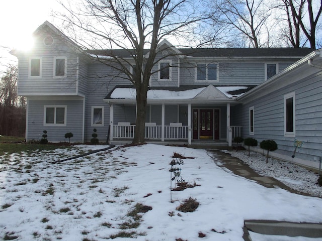 view of property with a porch