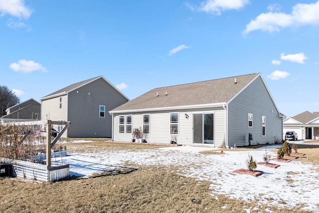 view of snow covered property