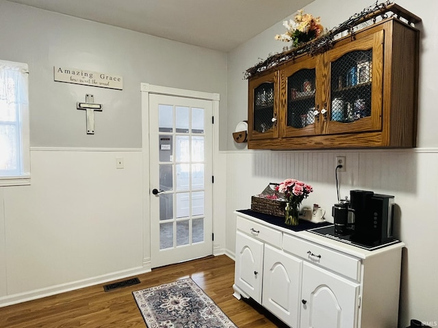 entryway with dark wood-type flooring