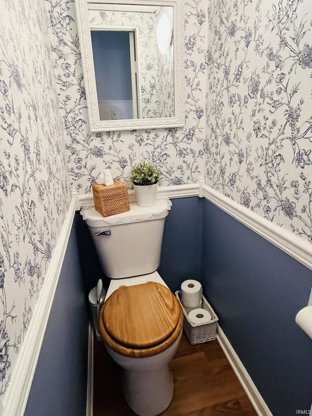 bathroom featuring toilet and hardwood / wood-style floors