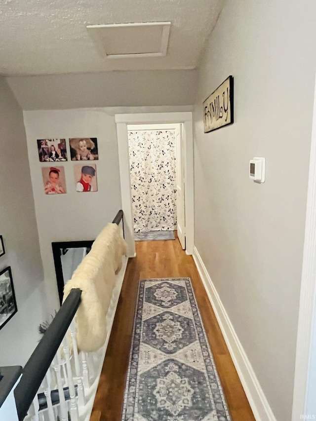 hall featuring wood-type flooring