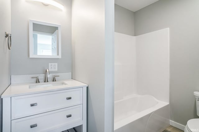 full bathroom with vanity, toilet, and tub / shower combination