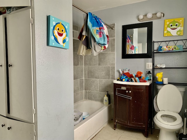 full bathroom with shower / tub combo with curtain, tile patterned floors, toilet, and vanity