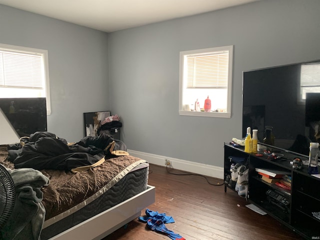 bedroom with hardwood / wood-style flooring