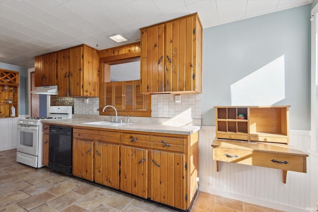 kitchen featuring sink, decorative backsplash, white range with gas stovetop, and black dishwasher