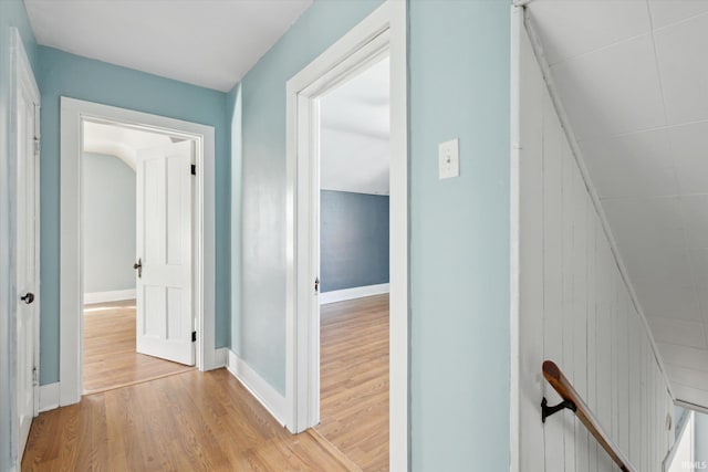 corridor with light wood-type flooring