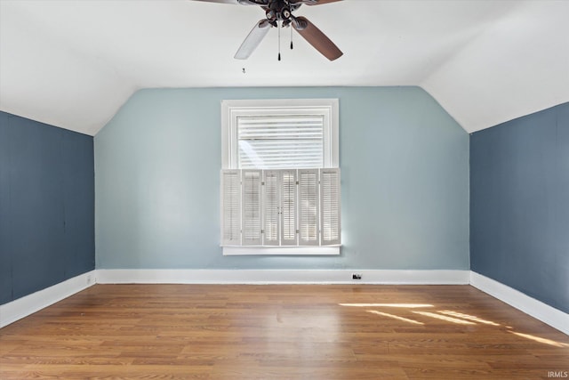 bonus room featuring ceiling fan, wood-type flooring, and vaulted ceiling