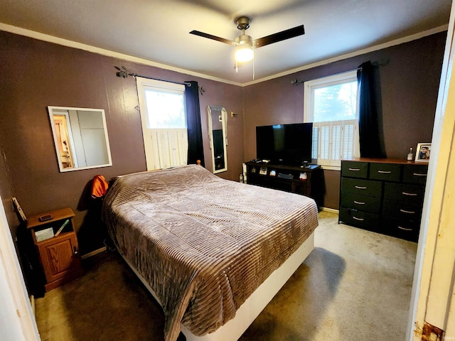 bedroom featuring light carpet, crown molding, and ceiling fan