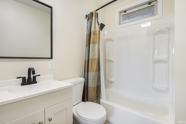 full bathroom with vanity, toilet, and shower / bath combo