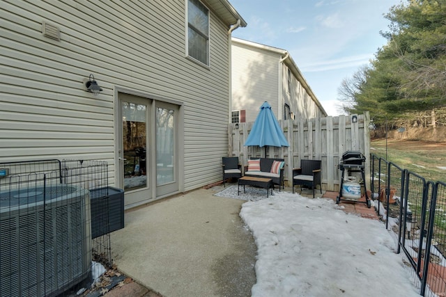 view of patio featuring area for grilling, an outdoor hangout area, and central air condition unit