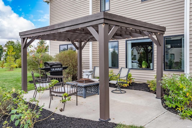 view of patio / terrace featuring an outdoor fire pit, a pergola, and a grill