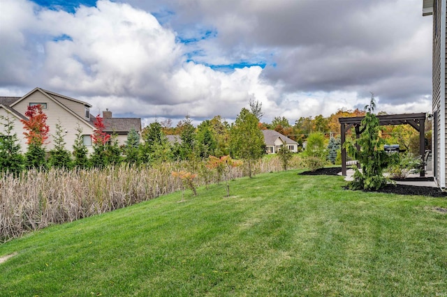 view of yard with a pergola