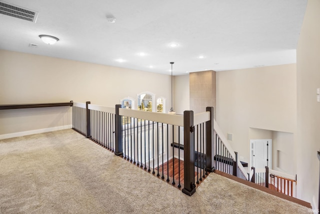 corridor with carpet floors