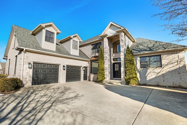 view of front of property with a garage