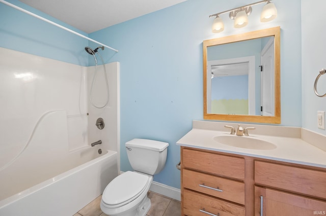 full bathroom featuring vanity, tile patterned floors, bathing tub / shower combination, and toilet