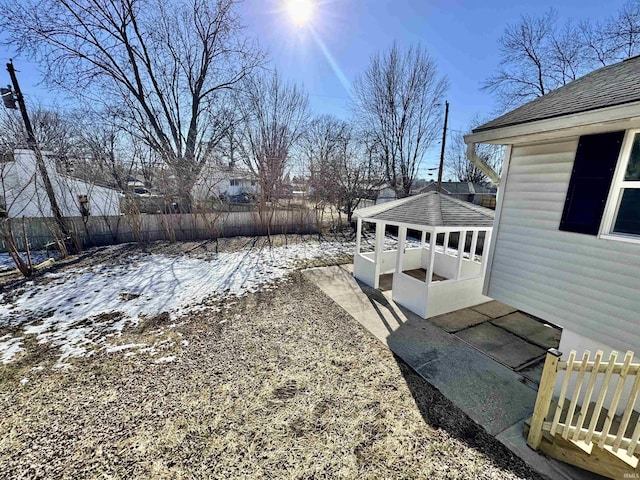 view of yard covered in snow