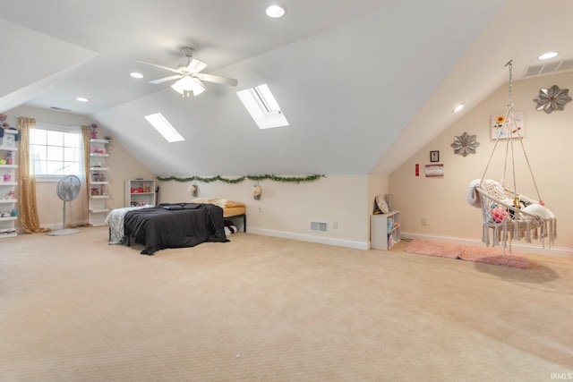 carpeted bedroom with lofted ceiling and ceiling fan