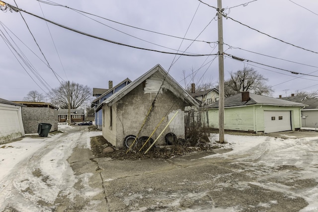 view of property exterior featuring a garage