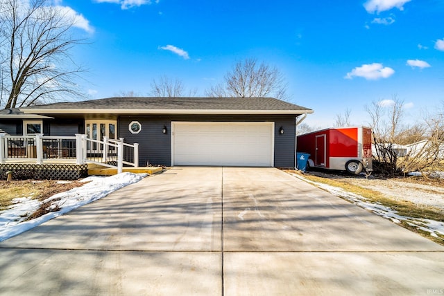 single story home with a garage