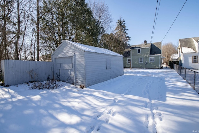 exterior space featuring an outbuilding and a garage