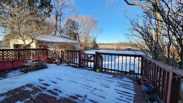 view of snow covered deck