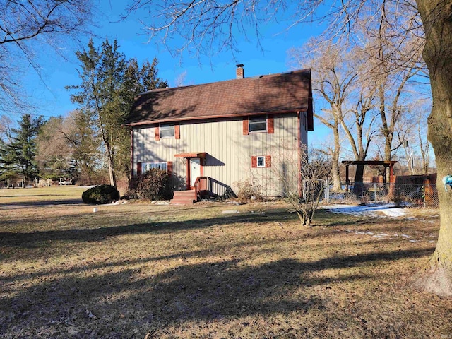 view of home's exterior featuring a lawn