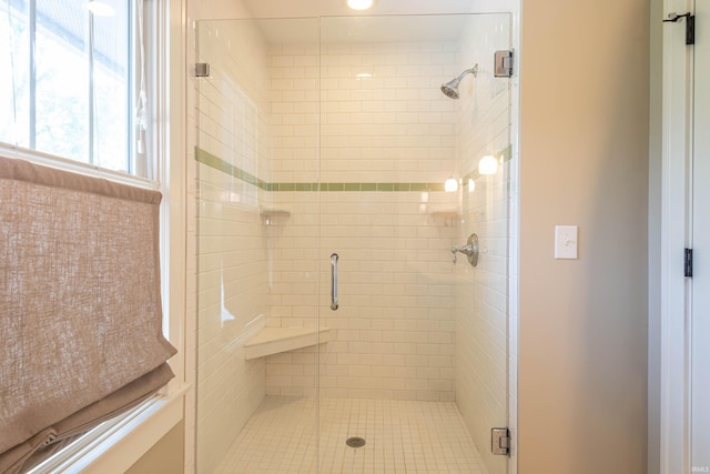 bathroom with an enclosed shower