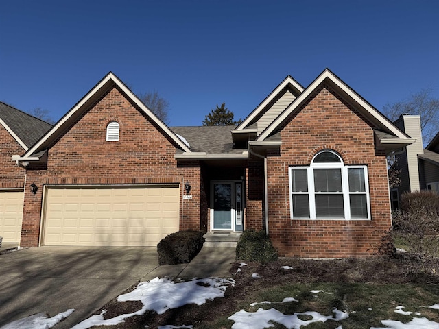 front of property with a garage