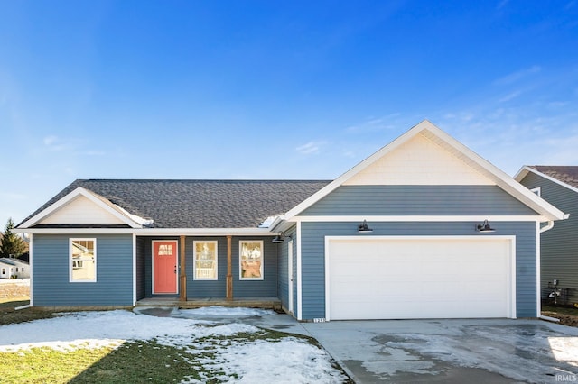 single story home featuring a garage