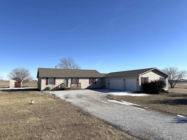 ranch-style home featuring a garage