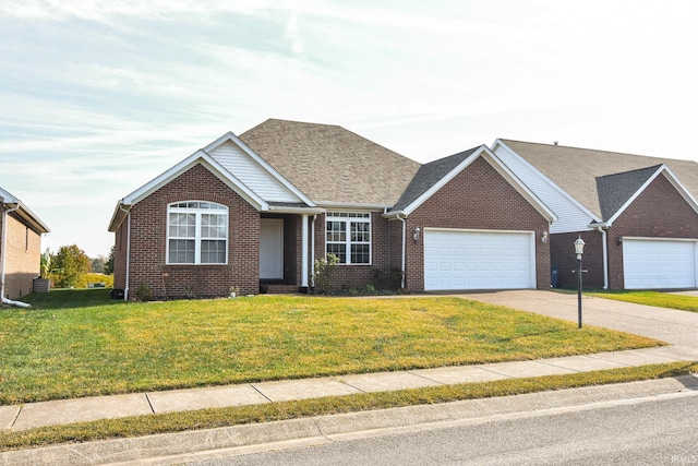 ranch-style home with a garage and a front yard