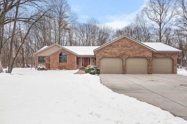 ranch-style house featuring a garage