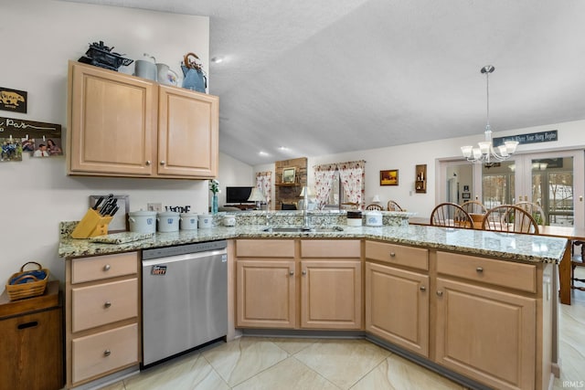 kitchen with sink, light brown cabinetry, vaulted ceiling, stainless steel dishwasher, and kitchen peninsula