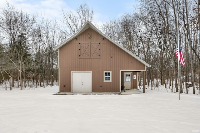 view of snow covered garage