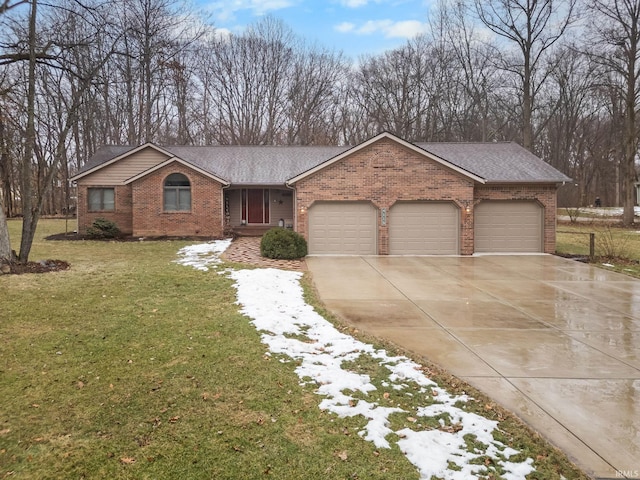 view of front of home featuring a garage and a front lawn