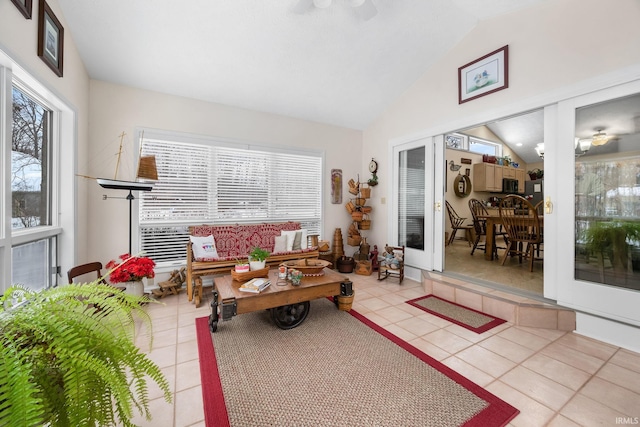 interior space featuring vaulted ceiling, a wealth of natural light, and ceiling fan