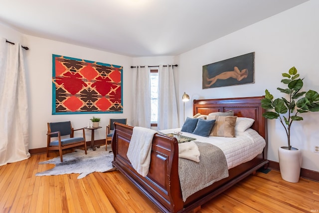 bedroom with wood-type flooring