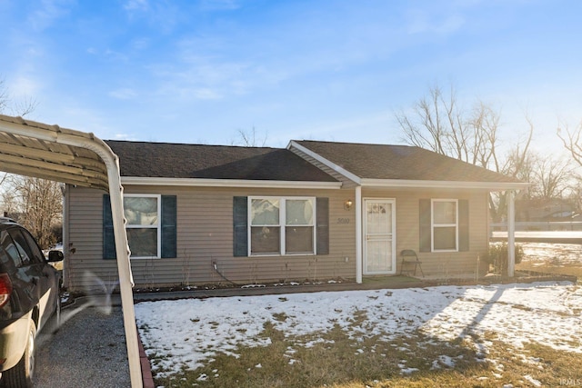 view of front of home with a carport