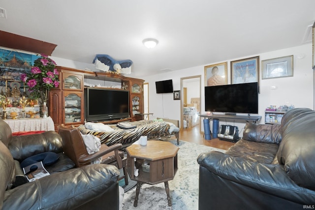 living room with light hardwood / wood-style flooring