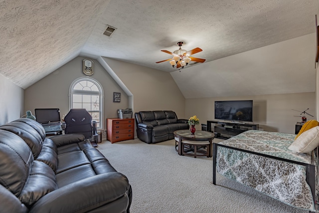 living room with ceiling fan, vaulted ceiling, light carpet, and a textured ceiling