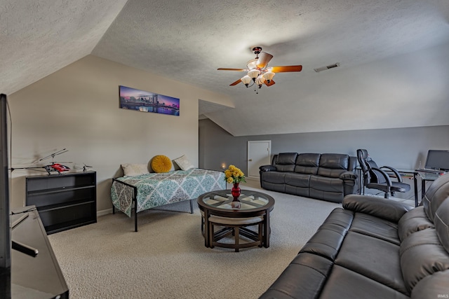 carpeted living room with ceiling fan, lofted ceiling, and a textured ceiling