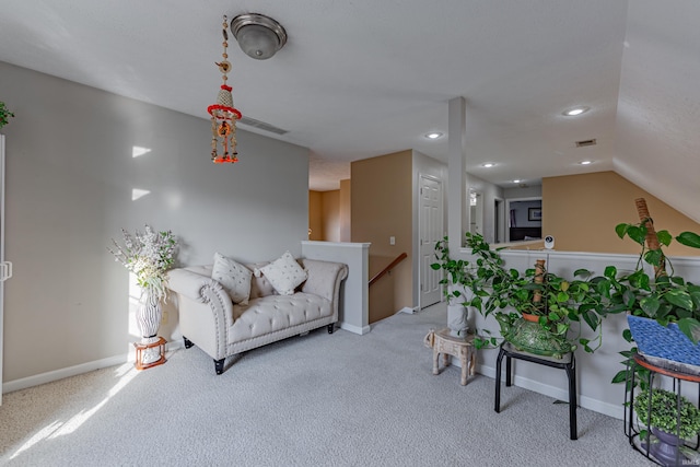 living room featuring light carpet