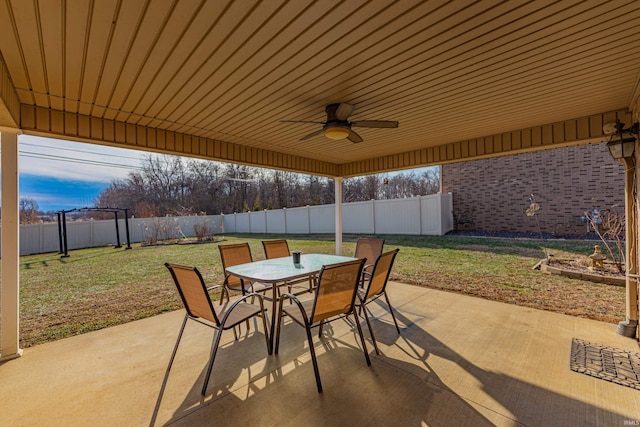 view of patio / terrace with ceiling fan and a pergola