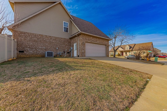 view of property exterior with central AC and a lawn