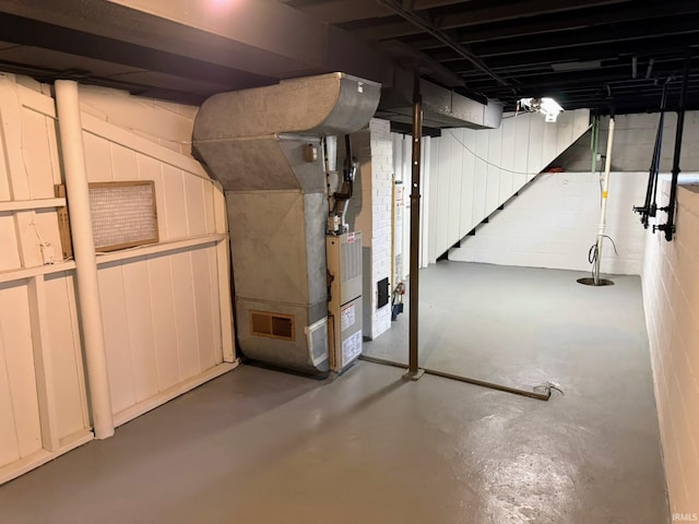 basement featuring heating unit