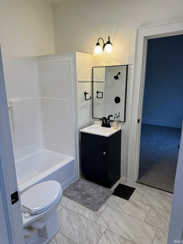 full bathroom featuring shower / tub combination, vanity, and toilet